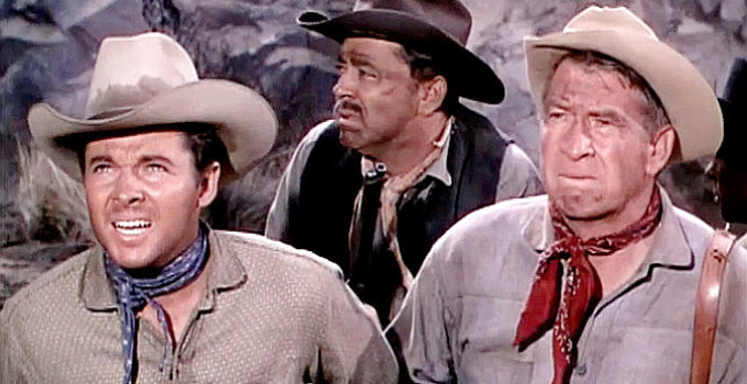 Audie Murphy as Jim Harvey and Chill Wills as Sheriff Murchoree preparing for an Indian attack in Tumbleweed (1953)