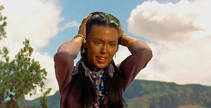 Barbara Rush as Oona, frantic as Taza and Naiche tussle in Taza, Son of Cochise (1954)