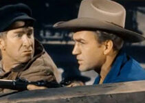 Chill Wills as Hogger McCoy and Forrest Tucker as Reed Loomis, with Indian trouble closing fast in Rock Island Trail (1950)