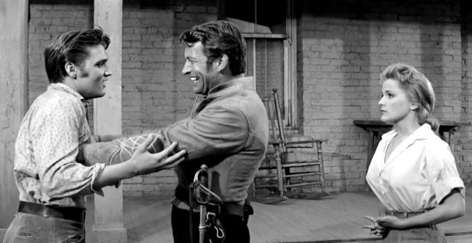 Elvis Presley as Clint Reno, Richard Egan as Vance Reno and Debra Paget as Cathy Reno in Love Me Tender (1956)