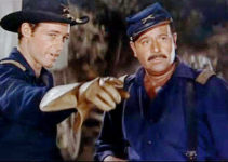 Guy Madison as Capt. Robert MacClaw and Don Shelton as Maj. Gibbs in The Command (1954)