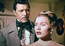 James Craig as Clay Clayburn as Barbara Payton as Kathy Summers in Drums in the Deep South (1951)