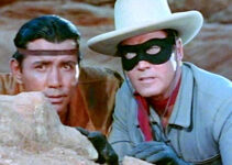 Jay Silverheels as Tonto and Clayton Moore as The Lone Ranger, doing their best to keep peace in The Lone Ranger (1956)