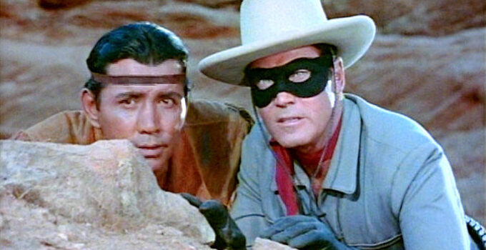 Jay Silverheels as Tonto and Clayton Moore as The Lone Ranger, doing their best to keep peace in The Lone Ranger (1956)
