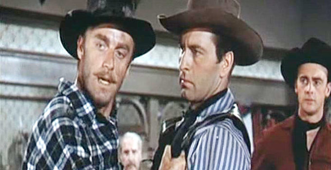 John Dehner as Emil Cabeau in a dispute with Bret Ivers (George Montgomery) as Larry Gallad (Jerome Courtland) looks on in Cripple Creek (1952)