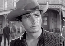 John Derek as Brock Mitchell, haunted by a violent past in Fury at Showdown (1957)