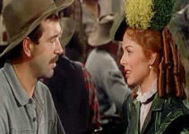 John Payne as Pete Black and Arleen Whelan as Rose Billings in Passage West (1951)