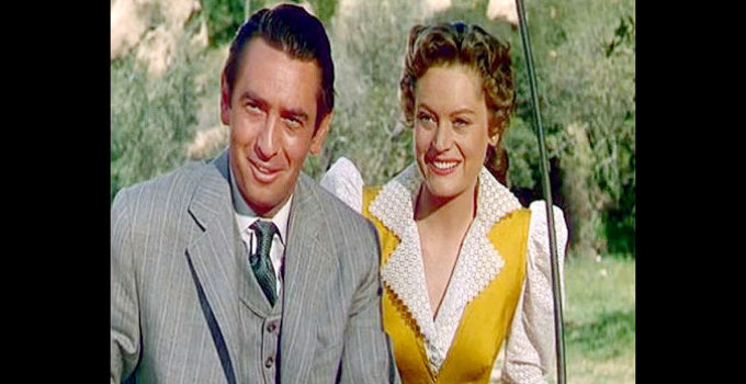 MacDonald Carey as Pete Carver and Alexis Smith as Elizabeth Trent in Cave of Outlaws (1951)