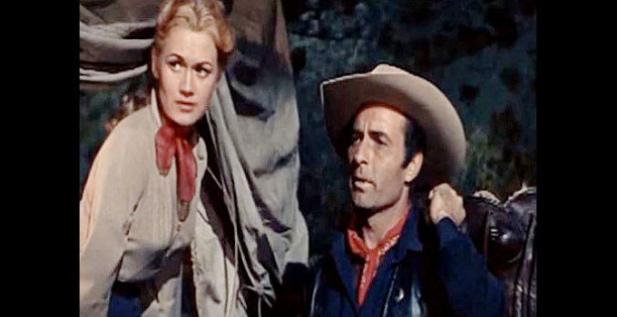 Marcia Henderson as Janet Hale and George Montgomery as Steve Patrick in Canyon River (1956)