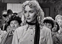 Maria Hart as Queenie Hart, helping the women of Big Bend express their will in court in Cattle Queen (1951)