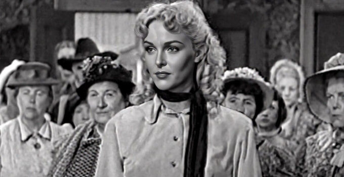 Maria Hart as Queenie Hart, helping the women of Big Bend express their will in court in Cattle Queen (1951)