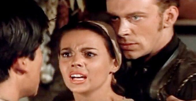 Natalie Wood as Maria Colton, under duress thanks to Jack Sutton (Skip Homeier) in The Burning Hills (1956)