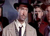 Philip Carey as Clay Hollister, James Griffith as Frank Hollister, William Leslie as Johny and Robert Wilke as Red reach the mine where $30,000 is supposedly hidden in Return from Warbow (1958)