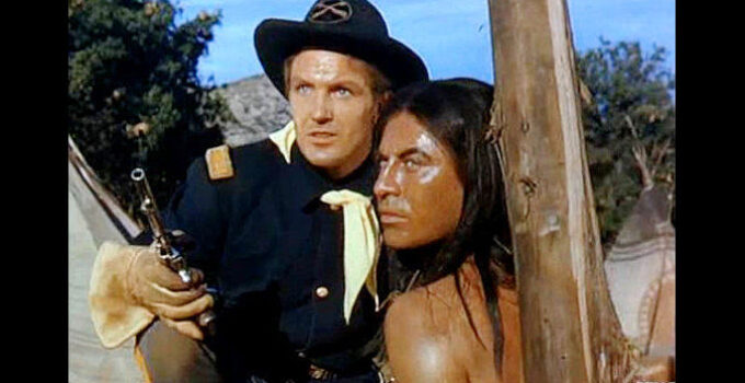 Robert Stack as Maj. Tom Burke and John Hodiak as Cochise, locked in battle side by side in Conquest of Cochise (1953)