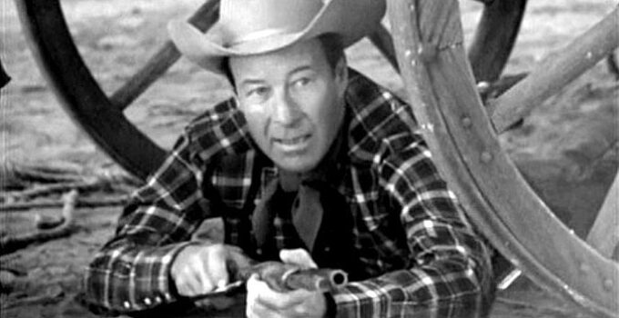 William 'Wild Bill' Elliott as Mace Corbin, protecting his dynamite in The Homesteaders (1953)