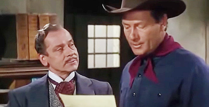 Baron Kurtvan Triesault as Baron Von Hollden and Joel McCrea as Clete Mattson in Border River (1954)