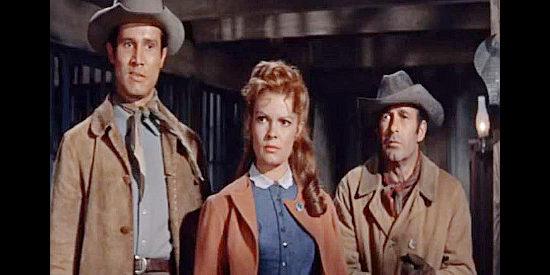 Patricia Owen as Peggy, finding herself a captive of Rennie (Henry Silva) and Burke (Eddie Firestone) in The Law and Jake Wade (1958)