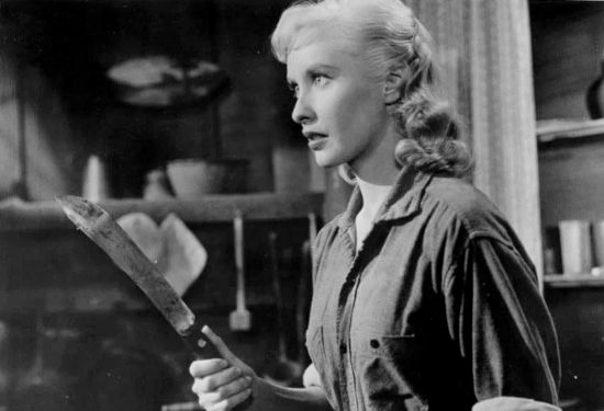 Penny Edwards as Susan Crowley, reading to fight for her life, knife against six-gun in Ride a Violent Mile (1957)