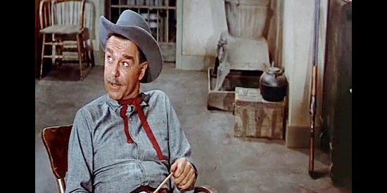 Phillip Terry as the sheriff, warning Dan Beattie he's putting his life in jeopardy in The Man from God's Country (1958)