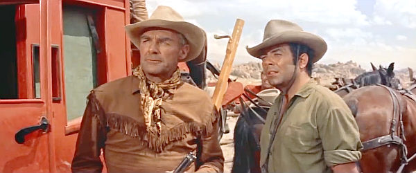 Randolph Scott as Ben Brigade and Pernell Roberts as Sam Boone spot Indian trouble coming their way in Ride Lonesome (1959)
