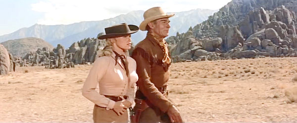 Randolph Scott as Ben Brigade leading Mrs. Lane (Karen Steele) out to negotiate with the Indians in Ride Lonesome (1959)