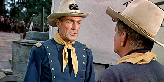 Randolph Scott as Capt. Tom Benson, giving orders to Sgt. Bates in Seventh Cavalry (1956)