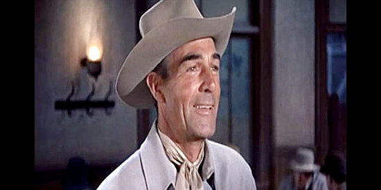 Randolph Scott as Jeff Kincaid, returning home to try to build a railroad through the mountains in Carson City (1952)