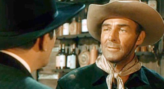 Randolph Scott as Jim Redfern, in a disagreement with Frank Walsh (Victor Jory) in The Cariboo Trail (1950)