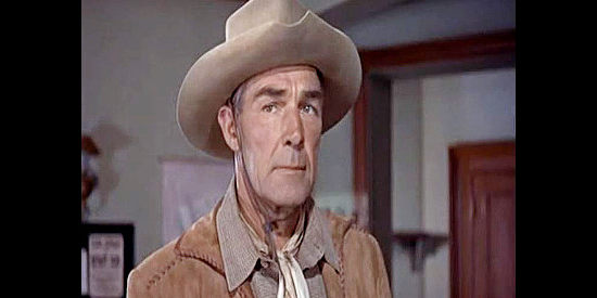Randolph Scott as Larry Delong, trying to even the score with a killer named Marady in Riding Shotgun (1954)