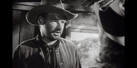 Ray Teal as Brock, demanding answsers from Candace Bronson (Rhonda Fleming) in The Redhead and the Cowboy (1951)