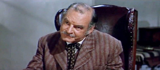 Ray Teal as Joe Sutton, the cattle king who tries to rule all the land around Esperanza in The Burning Hills (1956)