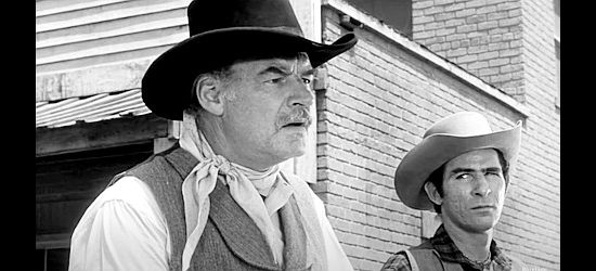 Ray Teal as Russ Nevers, leader of the land grabbers, with hired gun Rink Witter (George Keymas) in Utah Blaine (1957)