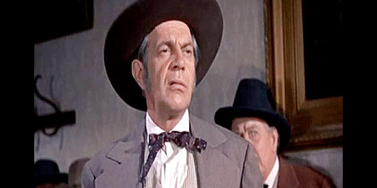Raymond Massey as Jack Davis, using a played-out mine to cover up his thievery in Carson City (1952)
