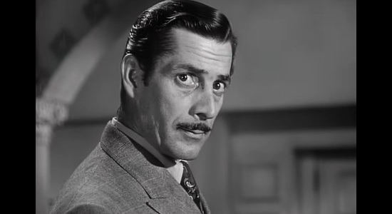Reed Haley as John Griff, the forgery expert assigned to the James Reavis case in The Baron of Arizona (1950)