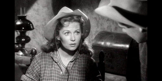 Rhonda Fleming as Candace Bronson, dragging Gil Kyle (Glenn Ford) into Civil War intrigue in The Redhead and the Cowboy (1951)