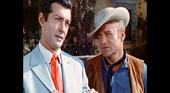 Rick Jason as Miguel Delmonte and Brian Keith as Jack McCracken, forming an unlikely alliance in Sierra Baron (1958)