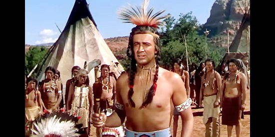 Rick Vallin as Pakanah, challenging Jim Bowie to a duel to the death in Comanche Territory (1950)