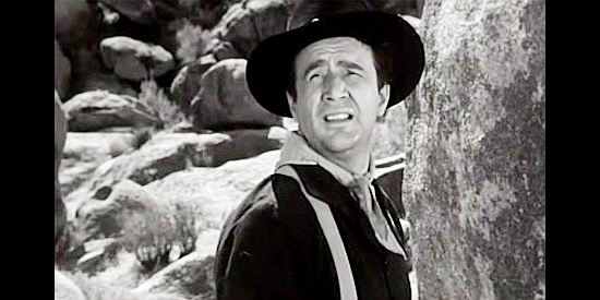 Rick Vallin as Reeger, scouting ahead for the patrol in Thunder Pass (1954)