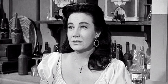 Rita Lynn as Hortensia, welcoming Matt Brown back to the ranch in Cast a Long Shadow (1959)