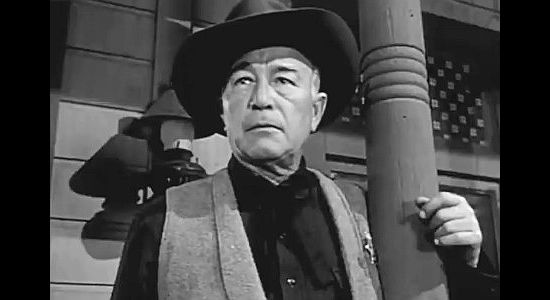 Robert Armstrong as Sheriff Ben Seale, the law in the feuding community of Pembroke in The Peacemaker (1956_
