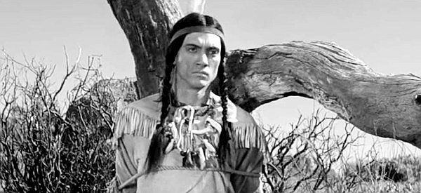 Robert 'Buzz' Henry as Little Wolf, facing slow death at the hands of Bandas's men in The Lawless Eighties (1957)