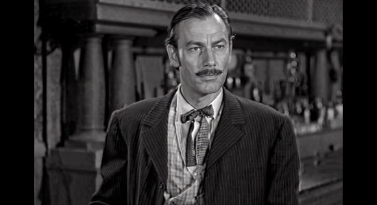 Robert Gardett as Duke Drake, fighting to take control of the cattle market in Cattle Queen (1951)