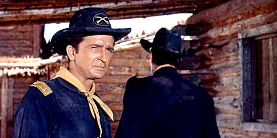 Robert Knapp as Lt. Waller, watching for a possible attempt by southern-leaning soldiers to steal a gold shipment in Revolt at Fort Laramie (1957)