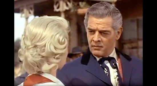 Robert Lowery as Col. Morgan, a town boss determined to keep Four Corners from becomng part of Texas in The Parson and the Outlaw (1957)