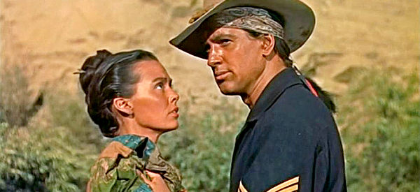 Rock Hudson as Taza, finding Oona (Barbara Rush) with whip marks and vowing vengeance in Taza, Son of Cochise (1954)