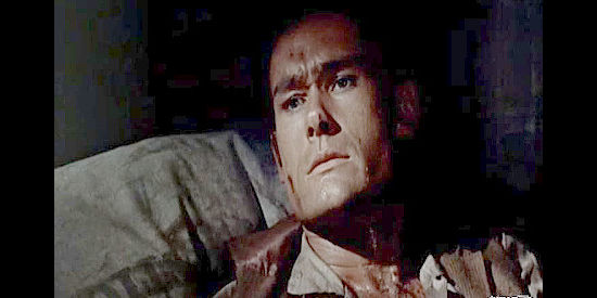 Ron Hayes as Danny Larsen, the younger brother seriously wounded helping Jim Larsen escape authorities in Face of a Fugitive (1959)