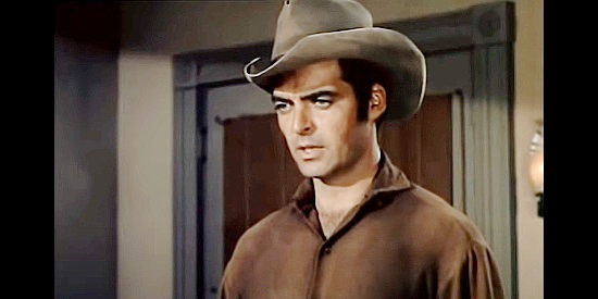 Rory Calhoun as Chino Bull, looking for a badge to help his avenge a partner's death in Powder River (1953)