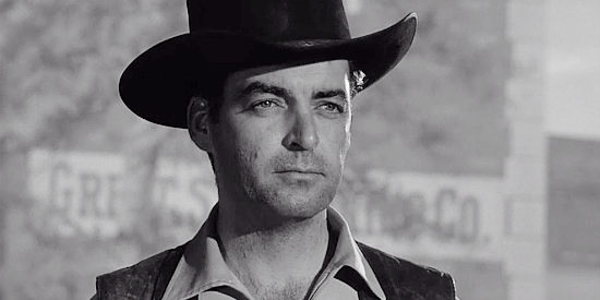 Rory Calhoun as Domino Kid, determined to put three more notches in his gun in The Domino Kid (1957)