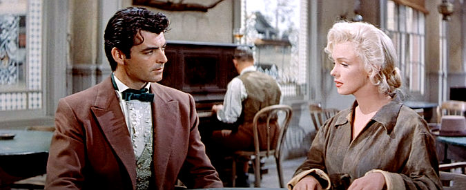 Rory Calhoun as Harry Weston, reunited with lover Kay (Marilyn Monroe) in Council City in River of No Return (1954)