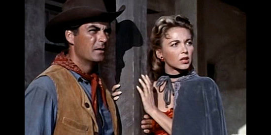 Rory Calhoun as Hemp Brown and Beverly Garland as Mona Langley watching a lynch mob gather in The Saga of Hemp Brown (1958)